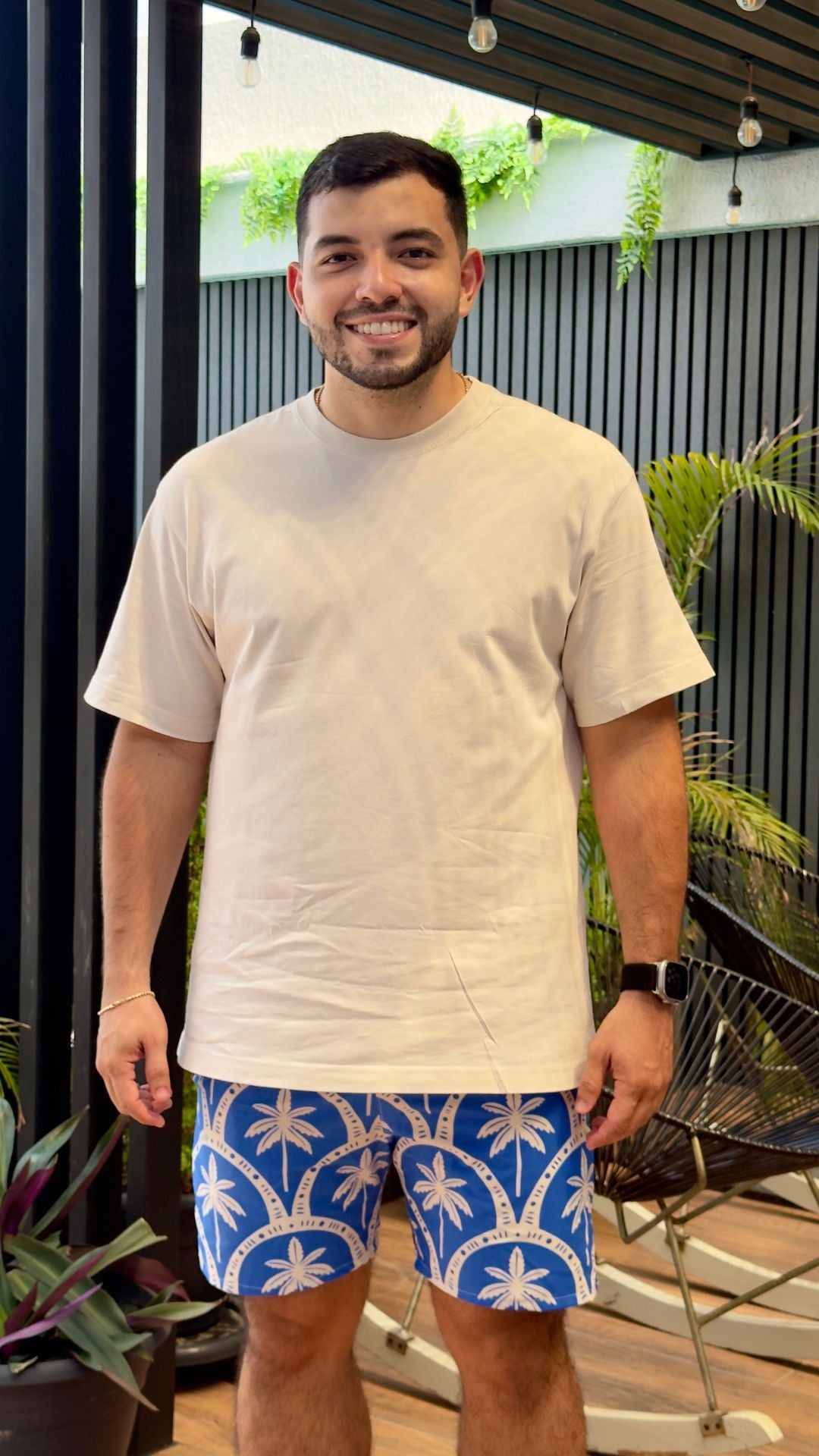 PANTALONETA ESTAMPADO AZUL CON PALMERAS